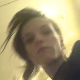 A girl records herself taking a painfully wide, hard, chunky shit from a rear and under ass perspective while bending over in front of a toilet. Presented in 720P HD. About 3 minutes.